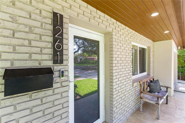 1261 San Miguel Ave, Coral Gables, FL 33134 - property entrance featuring brick siding