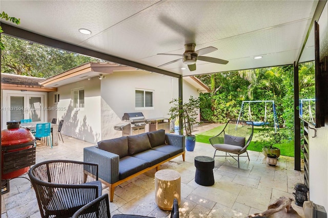 1261 San Miguel Ave, Coral Gables, FL 33134 - view of patio featuring an outdoor kitchen, outdoor lounge area, outdoor dining area, and ceiling fan