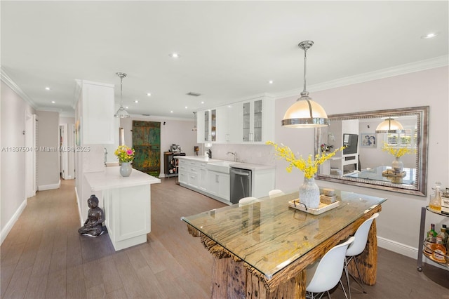 1261 San Miguel Ave, Coral Gables, FL 33134 - kitchen featuring stainless steel dishwasher, glass insert cabinets, light countertops, white cabinets, and crown molding