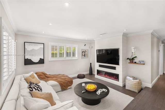 1261 San Miguel Ave, Coral Gables, FL 33134 - living room featuring recessed lighting, wood finished floors, a large fireplace, and crown molding