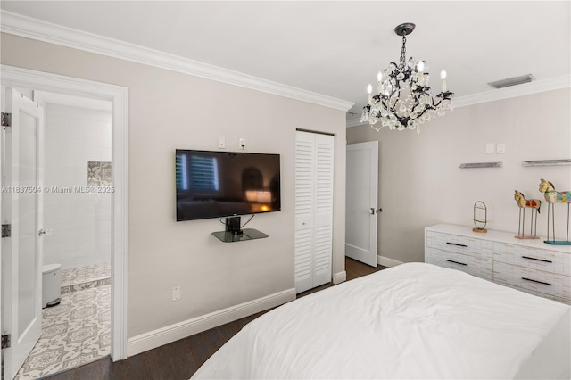 1261 San Miguel Ave, Coral Gables, FL 33134 - bedroom with ornamental molding, a chandelier, dark wood-type flooring, a closet, and connected bathroom