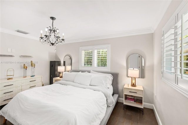 1261 San Miguel Ave, Coral Gables, FL 33134 - bedroom featuring crown molding, dark wood-style floors, and a chandelier