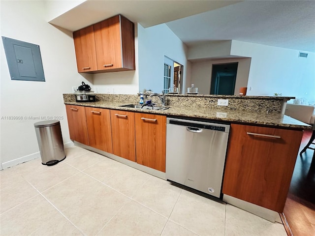 9066 SW 73rd Ct Unit 1409, Miami, FL 33156 - kitchen with dishwasher, electric panel, a peninsula, dark stone counters, and brown cabinetry