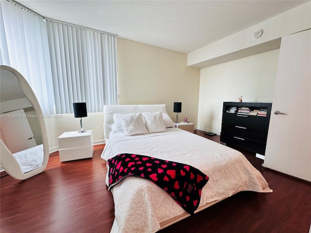 9066 SW 73rd Ct Unit 1409, Miami, FL 33156 - bedroom featuring dark wood finished floors