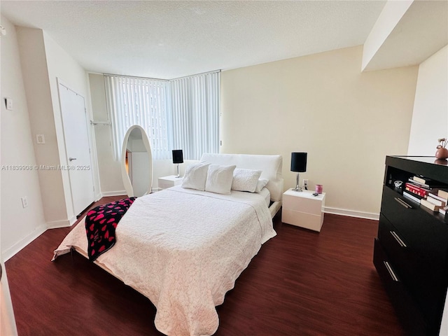 9066 SW 73rd Ct Unit 1409, Miami, FL 33156 - bedroom with dark wood-style flooring