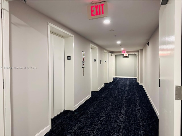 9066 SW 73rd Ct Unit 1409, Miami, FL 33156 - hall with elevator and dark colored carpet