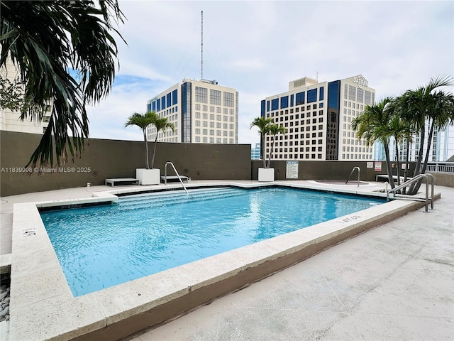 9066 SW 73rd Ct Unit 1409, Miami, FL 33156 - community pool with a patio