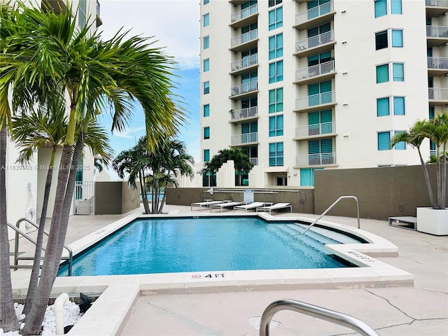 9066 SW 73rd Ct Unit 1409, Miami, FL 33156 - community pool with a patio