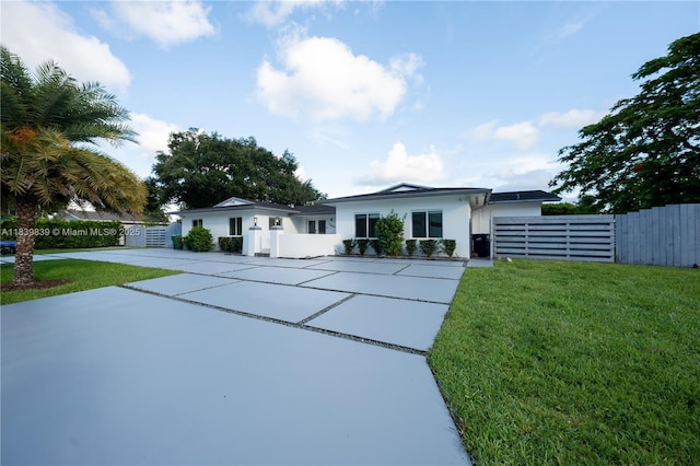 10860 SW 116th St, Miami, FL 33176 - view of front of house featuring concrete driveway and stucco siding