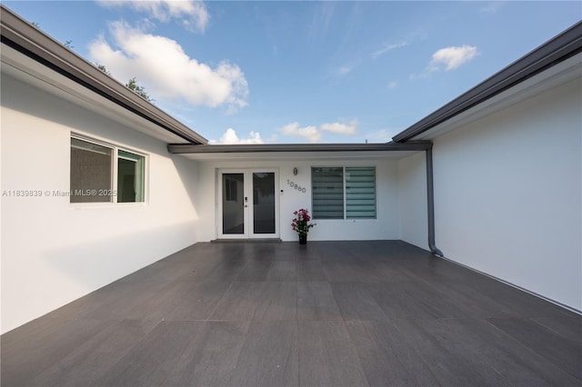 10860 SW 116th St, Miami, FL 33176 - view of patio featuring french doors
