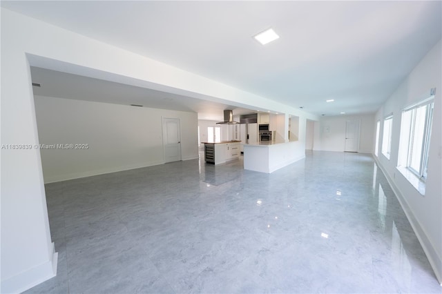 10860 SW 116th St, Miami, FL 33176 - unfurnished living room featuring baseboards