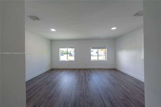 10860 SW 116th St, Miami, FL 33176 - spare room featuring dark wood-type flooring and baseboards