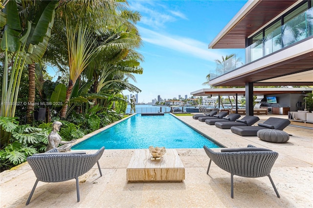 126 W San Marino Dr, Miami Beach, FL 33139 - swimming pool featuring a patio