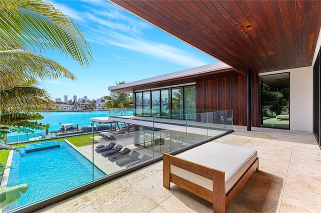 126 W San Marino Dr, Miami Beach, FL 33139 - swimming pool with a patio and a water view