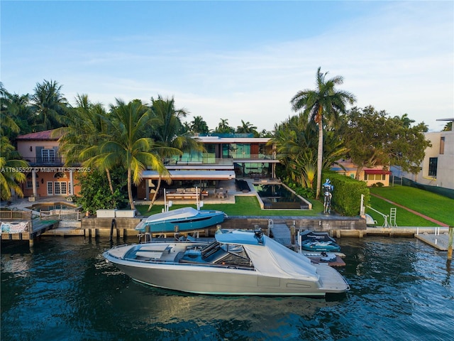 126 W San Marino Dr, Miami Beach, FL 33139 - dock area with a water view and a lawn