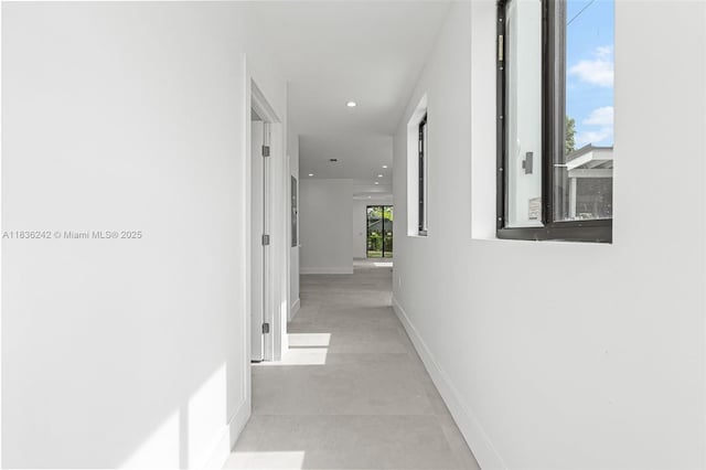 1271 NW 38th St, Miami, FL 33142 - corridor with baseboards and recessed lighting