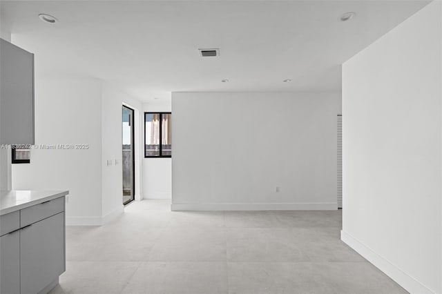 1271 NW 38th St, Miami, FL 33142 - spare room featuring baseboards