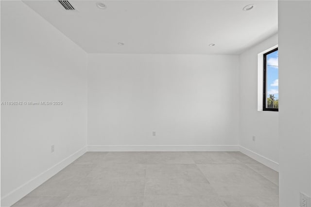 1271 NW 38th St, Miami, FL 33142 - unfurnished room with baseboards and recessed lighting