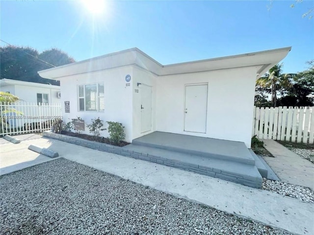 1130 NE 111th St, Biscayne Park, FL 33161 - property entrance with stucco siding