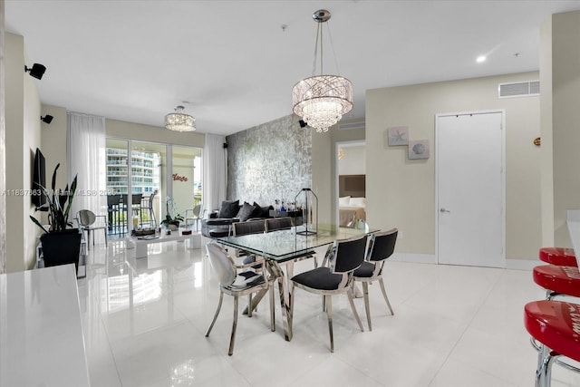 200 Sunny Isles Blvd Unit Th-404, Sunny Isles Beach, FL 33160 - dining room with a chandelier and tile patterned floors