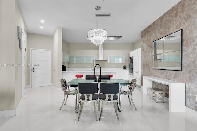 200 Sunny Isles Blvd Unit Th-404, Sunny Isles Beach, FL 33160 - dining area with light tile patterned flooring and a chandelier