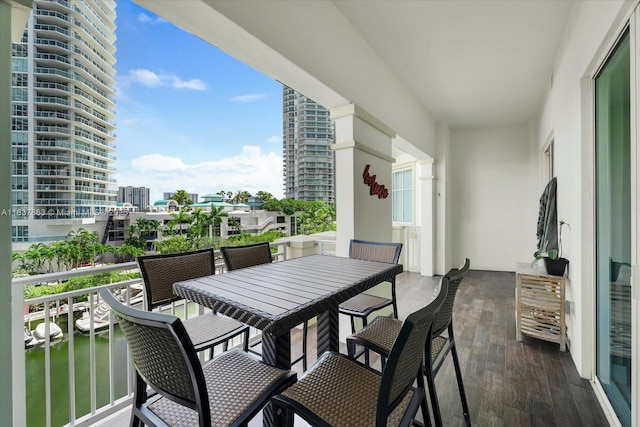 200 Sunny Isles Blvd Unit Th-404, Sunny Isles Beach, FL 33160 - balcony featuring a water view, outdoor dining space, and a view of city