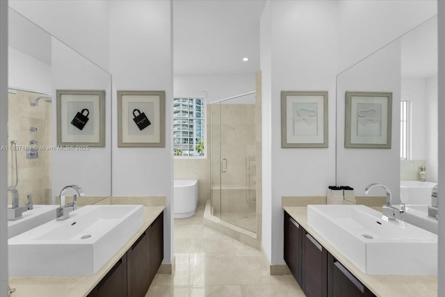 200 Sunny Isles Blvd Unit Th-404, Sunny Isles Beach, FL 33160 - bathroom with a stall shower, two vanities, and a soaking tub