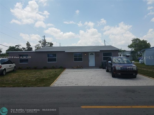 1610 S 22nd Ave, Hollywood, FL 33020 - ranch-style house with a front lawn