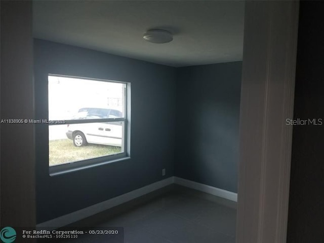 1610 S 22nd Ave, Hollywood, FL 33020 - tiled spare room featuring baseboards