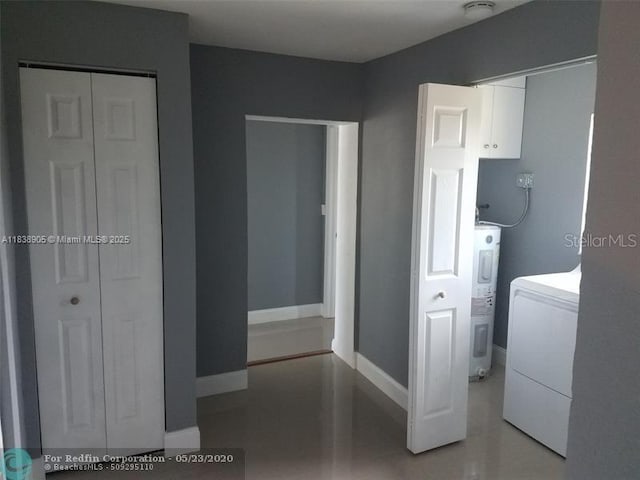 1610 S 22nd Ave, Hollywood, FL 33020 - laundry room featuring washer / clothes dryer and electric water heater