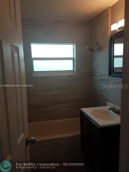 1610 S 22nd Ave, Hollywood, FL 33020 - bathroom with vanity and tub / shower combination