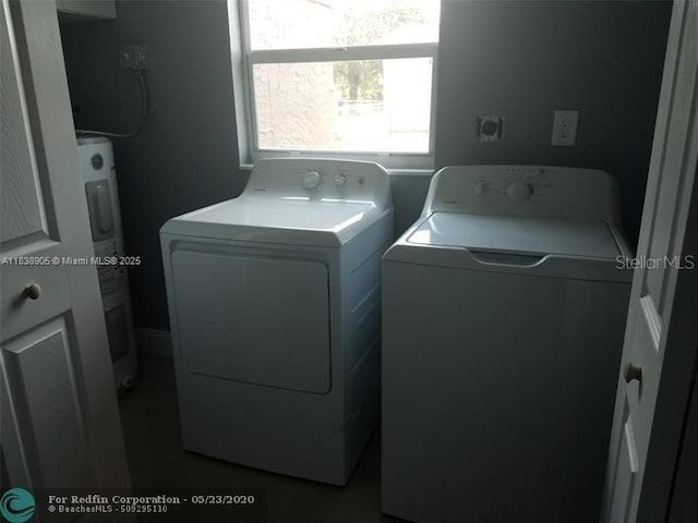 1610 S 22nd Ave, Hollywood, FL 33020 - laundry area with washing machine and dryer and water heater