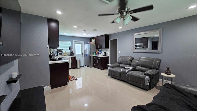1610 S 22nd Ave, Hollywood, FL 33020 - living area featuring a ceiling fan, light tile patterned floors, and recessed lighting