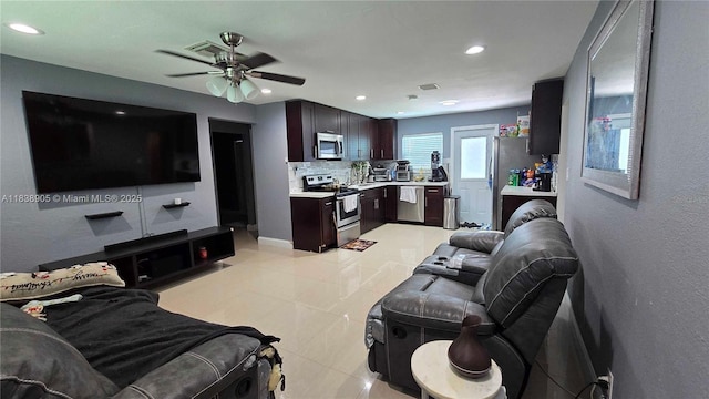 1610 S 22nd Ave, Hollywood, FL 33020 - living room with a ceiling fan, recessed lighting, and light tile patterned floors