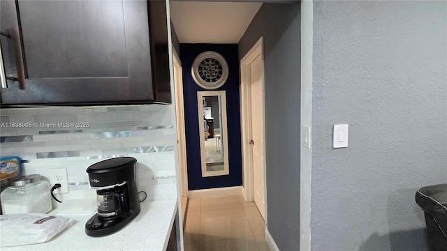 1610 S 22nd Ave, Hollywood, FL 33020 - hallway featuring tile patterned flooring and a textured wall