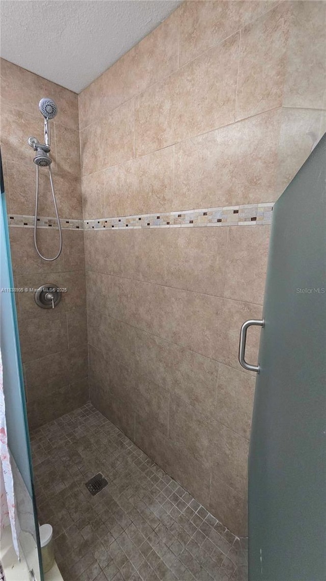 1610 S 22nd Ave, Hollywood, FL 33020 - full bathroom with a shower stall and a textured ceiling