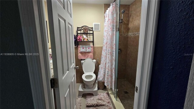 1610 S 22nd Ave, Hollywood, FL 33020 - full bath featuring a stall shower and tile walls