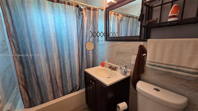 1610 S 22nd Ave, Hollywood, FL 33020 - full bath featuring tile walls, shower / tub combo with curtain, and vanity