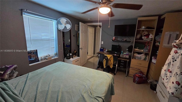 1610 S 22nd Ave, Hollywood, FL 33020 - bedroom featuring multiple windows, a ceiling fan, and light tile patterned flooring