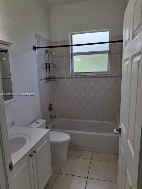 16961 SW 213th Ln, Miami, FL 33187 - full bath featuring tile patterned floors, vanity, and washtub / shower combination