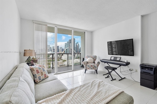 1750 SE Bayshore Dr Unit 2506, Miami, FL 33132 - living area with floor to ceiling windows, a textured ceiling, and tile patterned floors