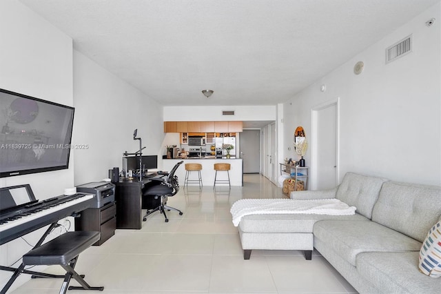 1750 SE Bayshore Dr Unit 2506, Miami, FL 33132 - living room with light tile patterned floors