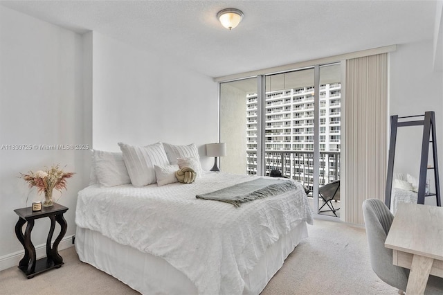 1750 SE Bayshore Dr Unit 2506, Miami, FL 33132 - bedroom featuring access to outside, carpet floors, and expansive windows