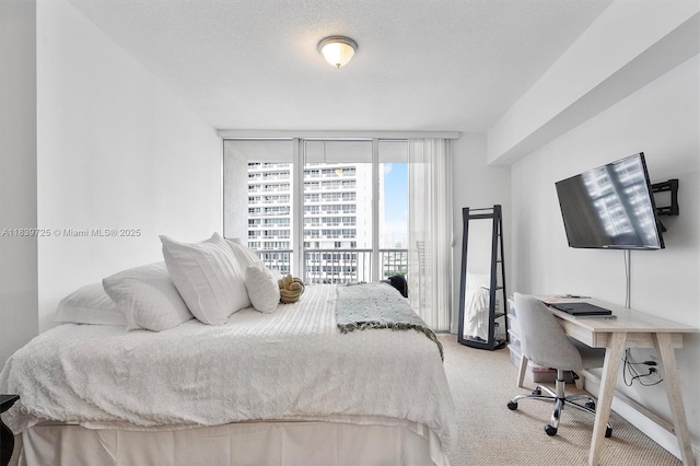 1750 SE Bayshore Dr Unit 2506, Miami, FL 33132 - carpeted bedroom with a desk and a wall of windows