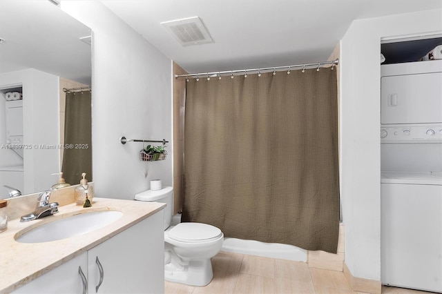 1750 SE Bayshore Dr Unit 2506, Miami, FL 33132 - bathroom featuring stacked washer and clothes dryer and vanity