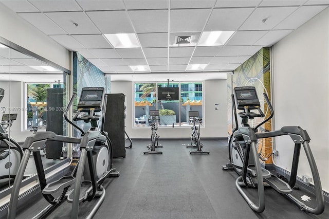 1750 SE Bayshore Dr Unit 2506, Miami, FL 33132 - exercise room featuring a paneled ceiling and healthy amount of natural light