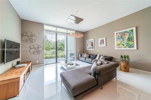 14951 Royal Oaks Ln Unit 102, North Miami, FL 33181 - living room featuring a chandelier, expansive windows, and light tile patterned floors