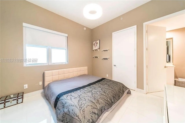 14951 Royal Oaks Ln Unit 102, North Miami, FL 33181 - bedroom featuring tile patterned floors