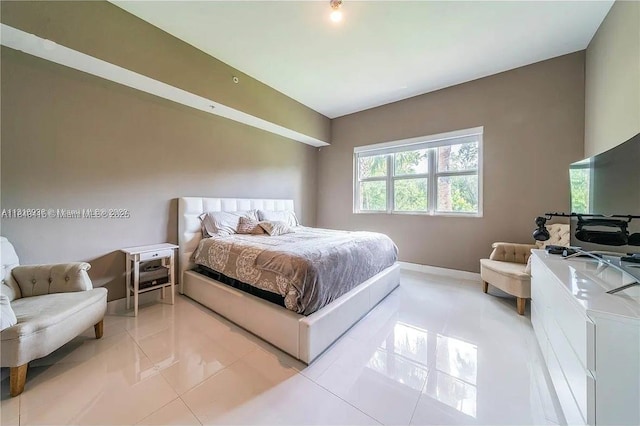 14951 Royal Oaks Ln Unit 102, North Miami, FL 33181 - bedroom featuring light tile patterned floors and baseboards