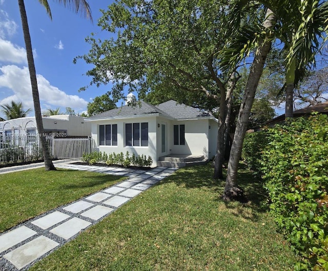 1923 NW 48th St, Miami, FL 33142 - ranch-style home featuring stucco siding and a shingled roof